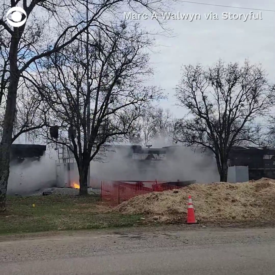 A train collided with the truck carrying a 130-foot truss concrete beam in Collegedale, Tennessee, resulting in 13 train cars derailing and minor injuries, officials said.