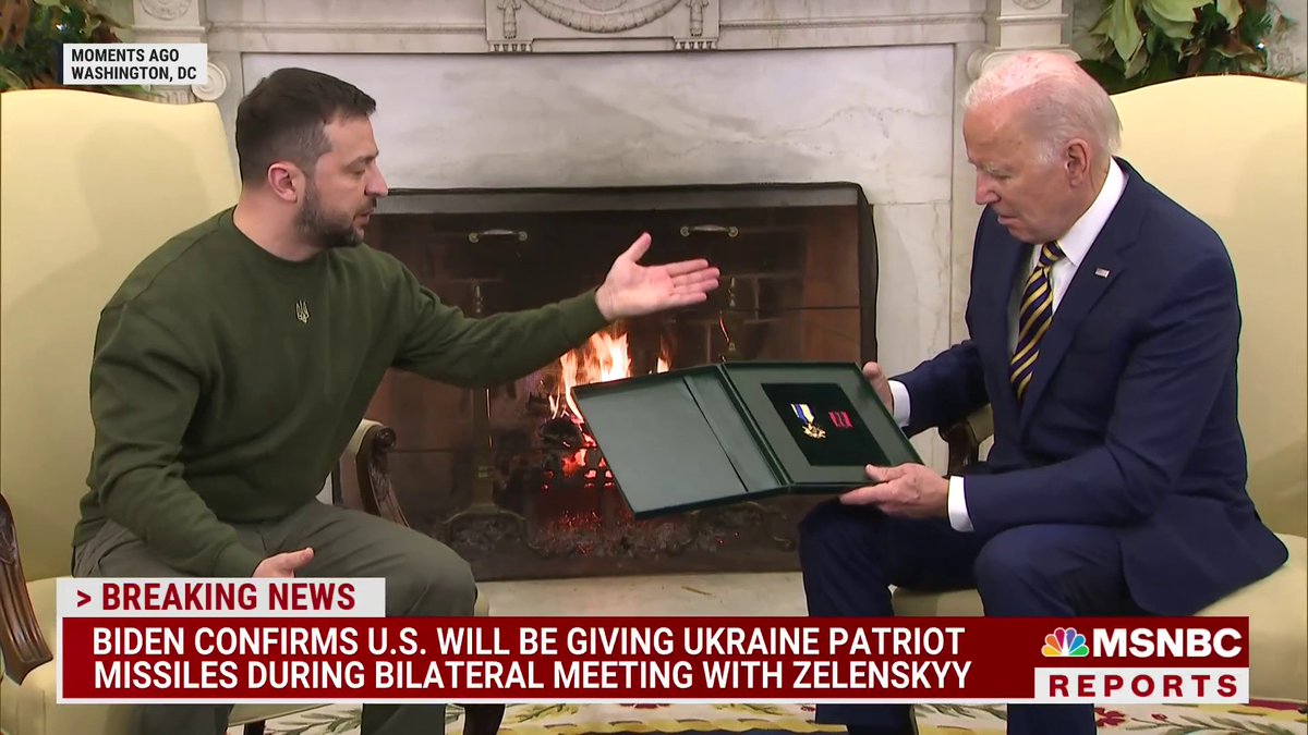 WATCH: Ukrainian President Zelenskyy presents President Biden with Ukrainian soldier's award. "He asked me to pass his award to President Biden...he is very brave and he said give it to a very brave president."