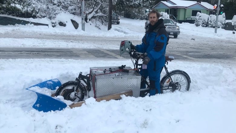 A B.C. man’s homemade bike-mounted snow plow comes in handy after this week’s storm. #TheMoment