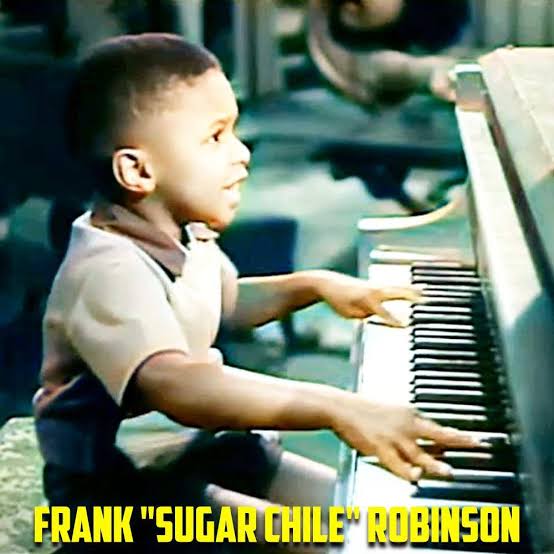 Self-taught, child prodigy piano player, Sugar Chile Robinson.
