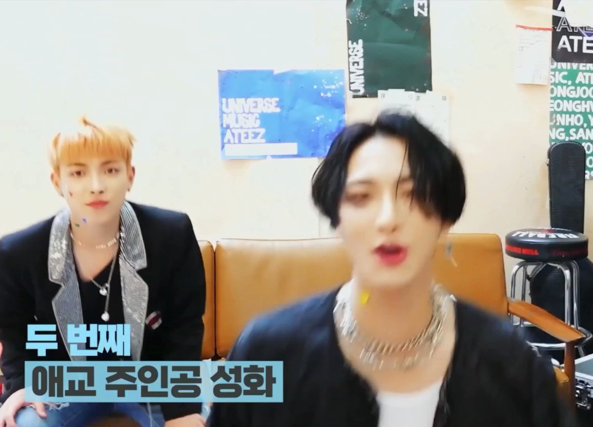 just hongjoong smiling at the back while seonghwa doing aegyo