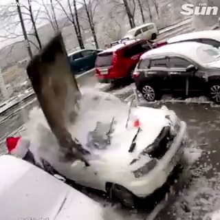 Man cheats death as a giant concrete slab falls onto his car