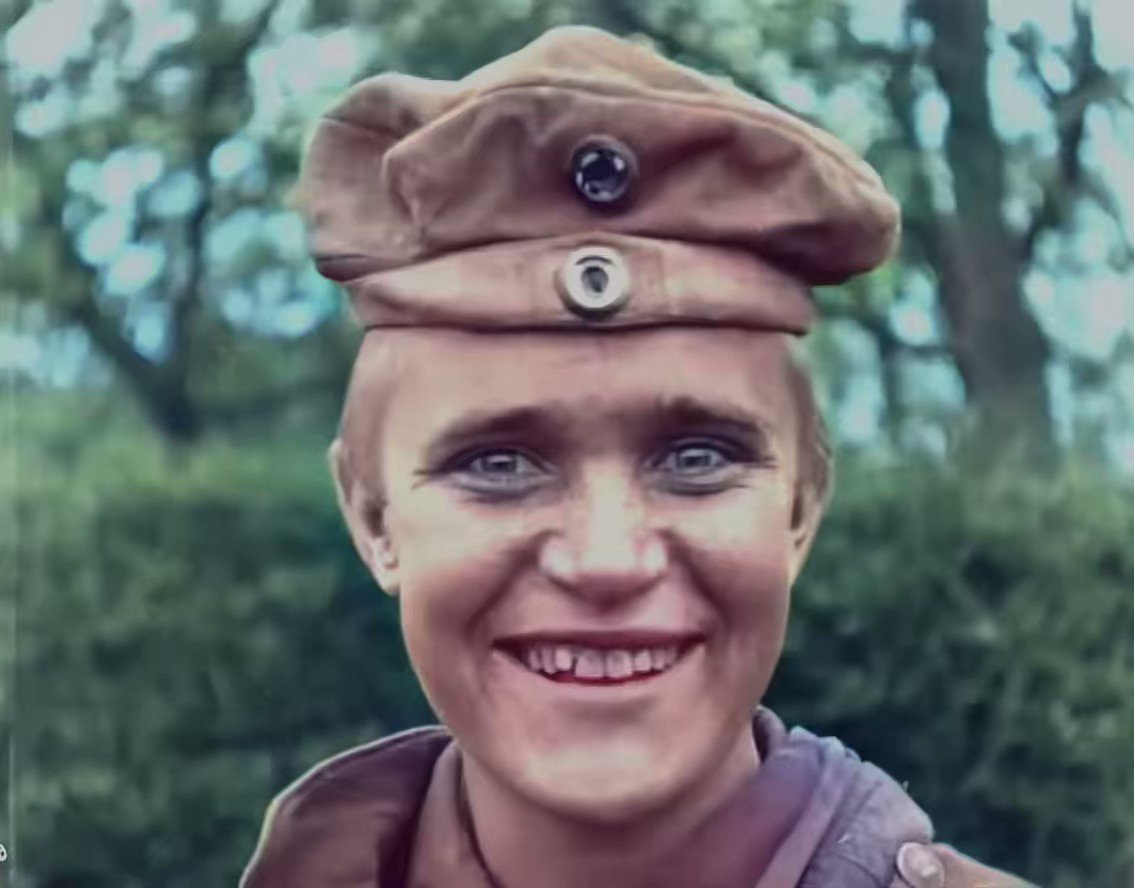 Young soldier grins and laughs on the last day of WWI