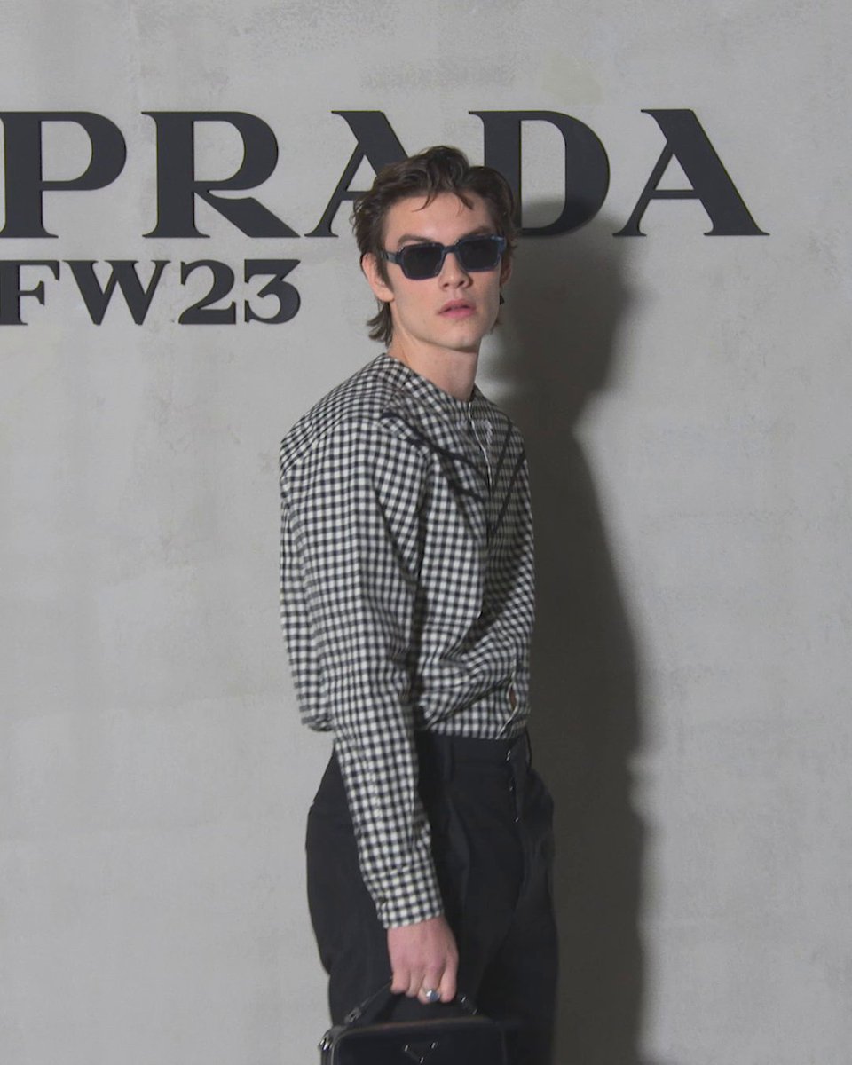 Prada guests arrive at the Fall/Winter 2023 menswear show space at the Fondazione Prada, ready to discover the collection presented by Miuccia Prada and Raf Simons. #MiucciaPrada #RafSimons #PradaPeople