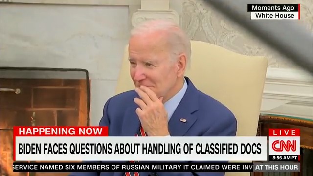Joe Biden sits back and smirks as he refuses to answer questions about hiding classified documents in his private office, garage, and home.