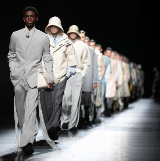 Closing with a corresponding version of the knitted balmacaan coat that opened it, (re)discover the finale of Friday's #DiorWinter23 show by Kim Jones in Paris. © By permission of T.S. Eliot Estate
