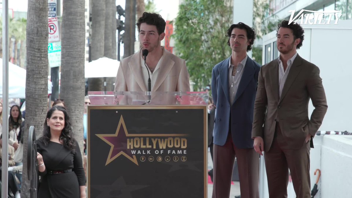 Jonas Brothers announce the release day of their new album and tease their upcoming tour at their Hollywood Walk of Fame ceremony.