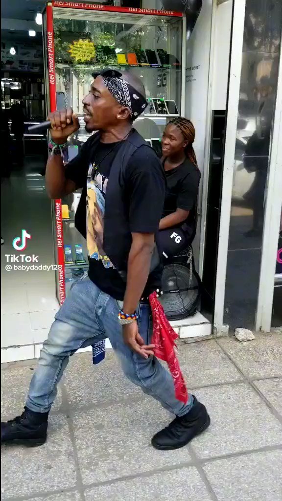 Seeing 2pac performing on Moi Avenue isn't how I expected my day to end.