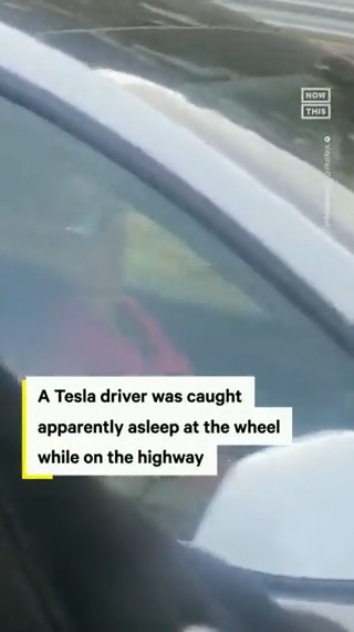 A viral video shows a woman apparently asleep at the wheel of a Tesla while the car drives on autopilot along a highway in southern California.
