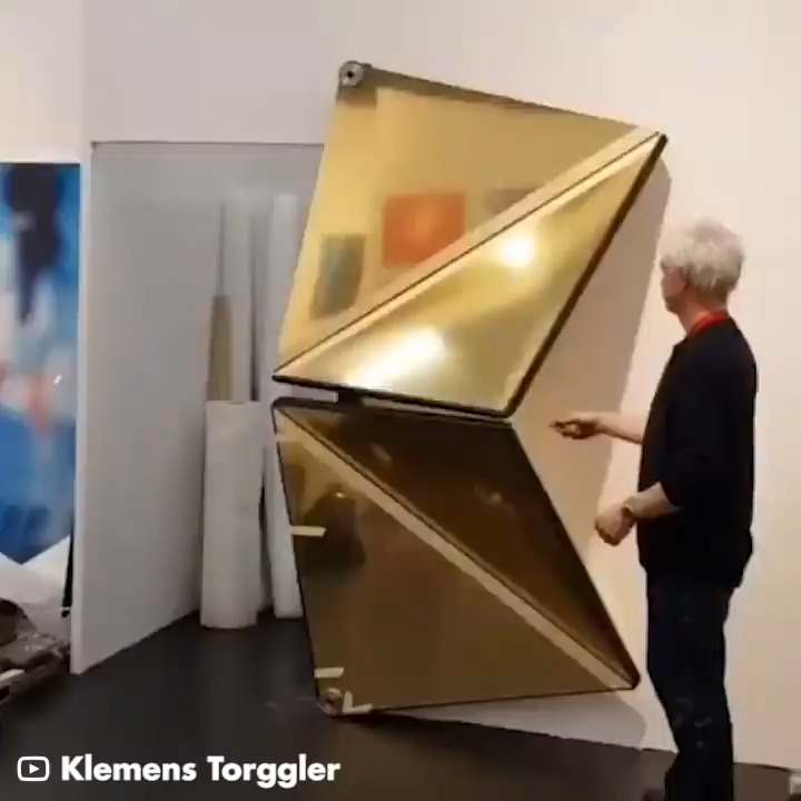 The EvolutionDoor, which is a kinetic art piece consisting of rotating squares, transforms the conventional concept of a door and reimagines its form, as envisioned by its creator, Klemens Torggle. Source GiGadgets