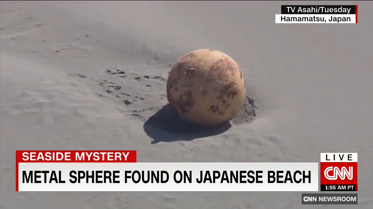 A large metal object appeared on a beach in Japan and shocked eyewitnesses and officials who have no idea what it is or where it came from