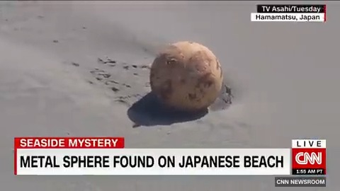 A large metal object appeared on a beach in Japan and shocked eyewitnesses and officials who have no idea what it is or where it came from