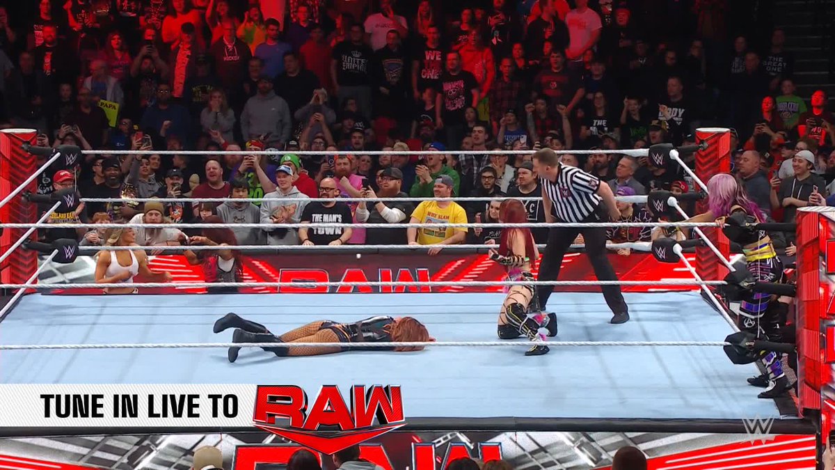 TRISH STRATUS IS BACK! Trish Stratus has returned on #WWERaw with her sights set on Bayley!