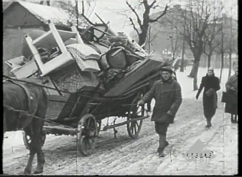 #OTD in 1941, German authorities established the Krakow ghetto. Nearly 20,000 Jews were imprisoned behind barbed wire and stone. In the next two years, almost all ghetto residents were shot en masse or deported to killing centers. Here, Jews are shown moving to the ghetto.