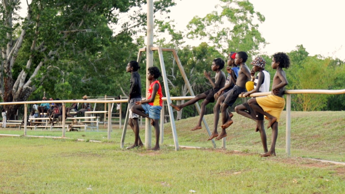 From war ground to community celebration. How football changed the remote town of Wadeye. Hear Jy Farrar’s story.