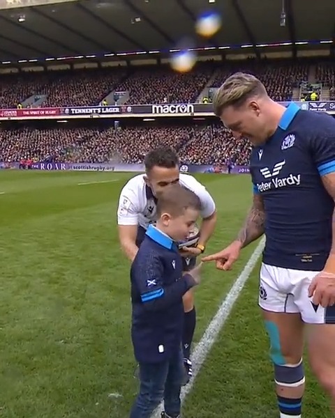 Archie Hogg delivers the match ball on the day of his dad's 100th Test 💙 #GuinnessSixNations | Scottish Rugby