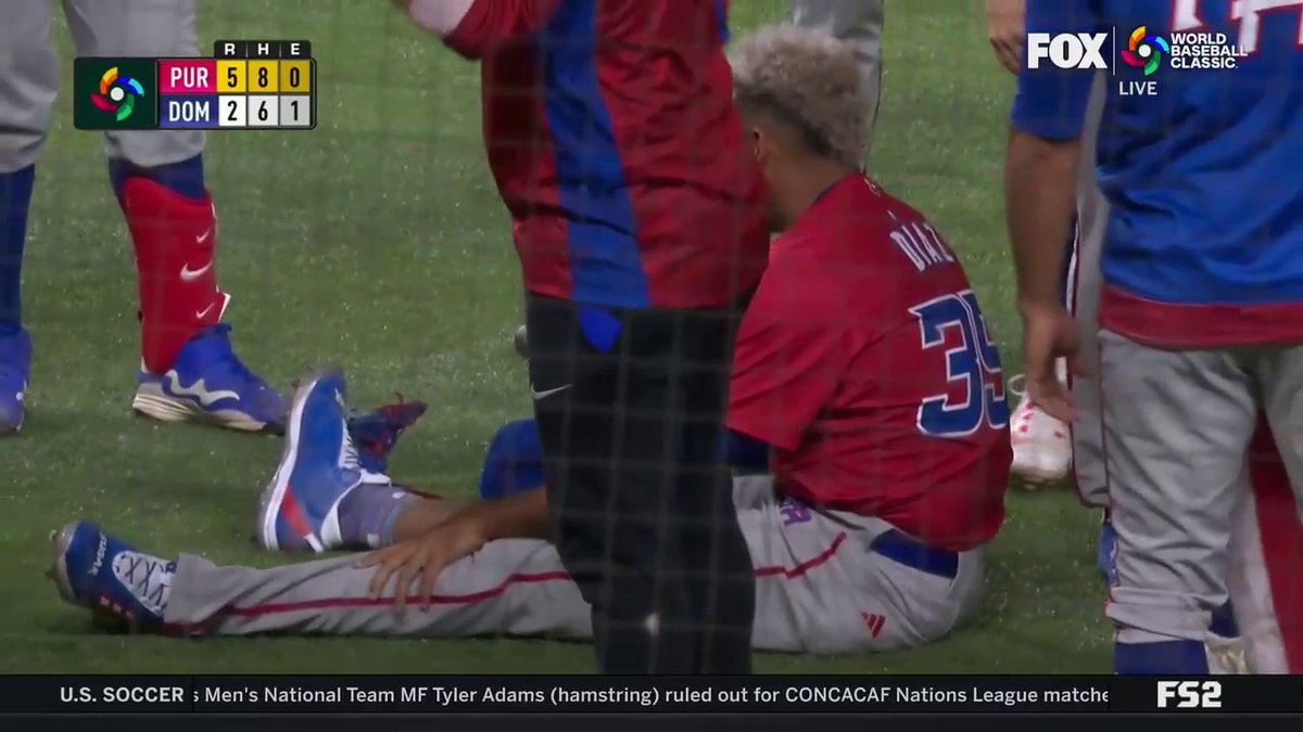 Oh my god. 💔 Edwin Diaz goes down during the team celebration and has to be carried off the field. Awful awful scene in Miami.
