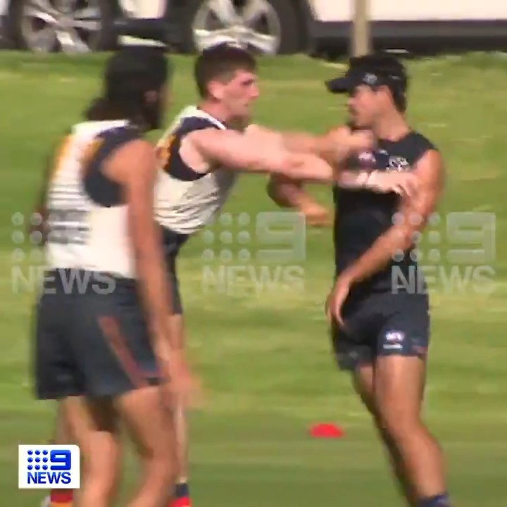 Things got heated at the Adelaide Crows training today, with forward Darcy Fogarty throwing a vicious elbow at new recruit Mark Keane after a crushing tackle. WATCH LIVE AT 6pm to see the latest footy news before round one. #9News