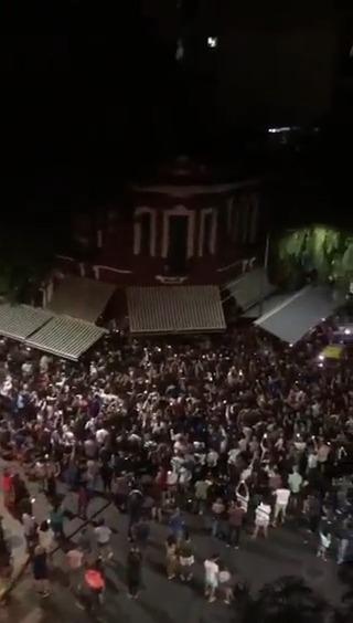 Crazy scenes outside a restaurant in Buenos Aires where Messi is having dinner