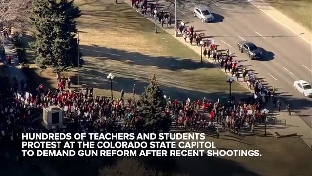 Moments ago: A line of hundreds of protestors marched around the Colorado State Capitol in hopes of urging lawmakers to take action on gun violence in schools.