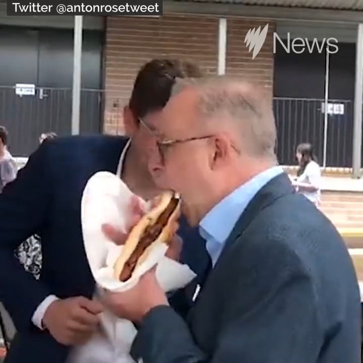 "No-one ever looked good eating a sausage": Anthony Albanese fails to evade the dreaded "sausage shot" during NSW election visit. Read more here: #nswpol #auspol #NSWVotes2023 #democracysausage