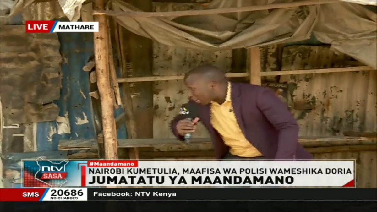 MATHARE: NTV Reporter, Brian Obuya, forced to take cover as protesters pelt stones to police officers blocking their way to Nairobi CBD. #Maandamano