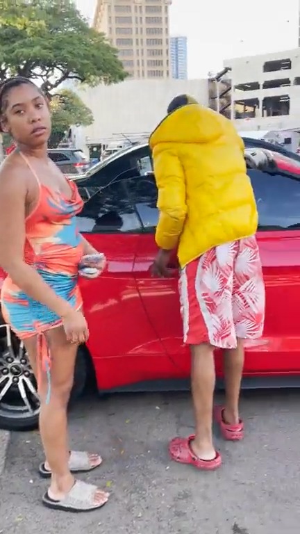 Tourist gets confronted for parking on the sidewalk across from the Hawaii convention center...
