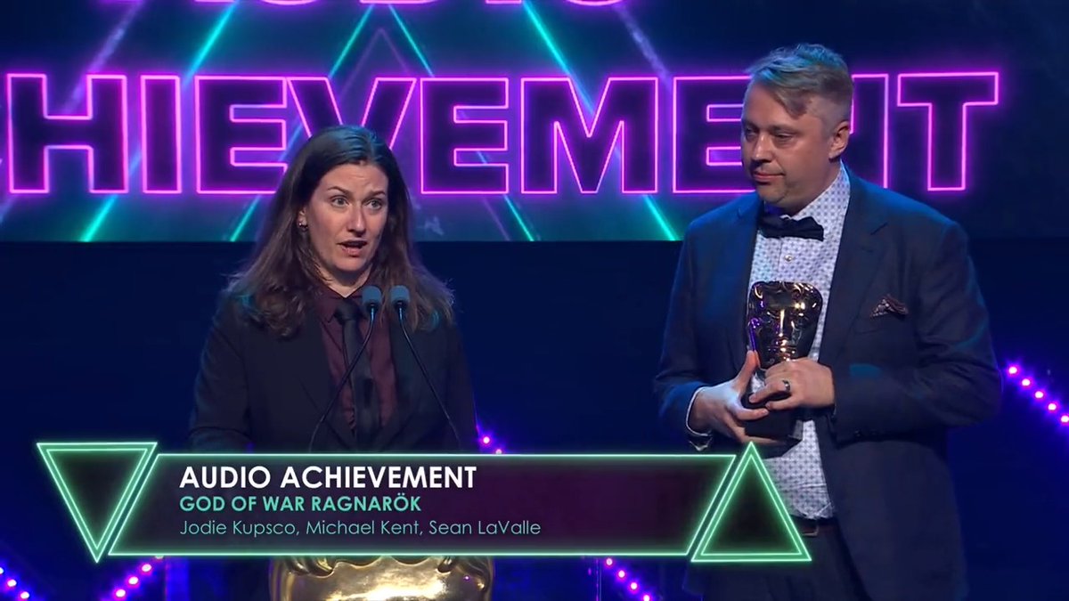 Listen up! Jodie Kupsco and Michael Kent accept the Audio Achievement BAFTA for God of War Ragnarök 👏 #BAFTAGamesAwards