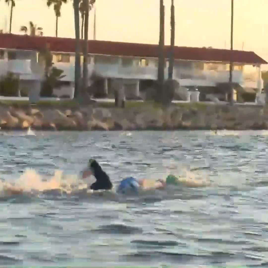 Adios 👋🏼 Holly Lawrence started 3 minutes after the Pro Men's pack, and she has started to pass some of them in the water 🔥 Follow all the live action for free now on #IM703Oceanside | #IRONMANtri | #AnythingIsPossible