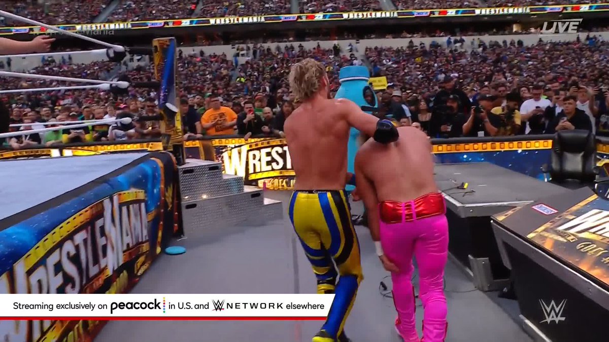 Logan Paul just frog splashed KSI through a table at Wrestlemania