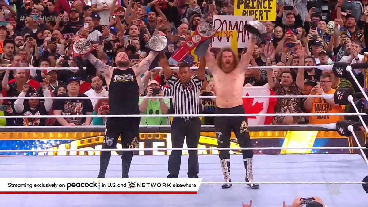 THEY DID IT! Kevin and Sami Zayn are your NEW Undisputed WWE Tag Team Champions at #WrestleMania!