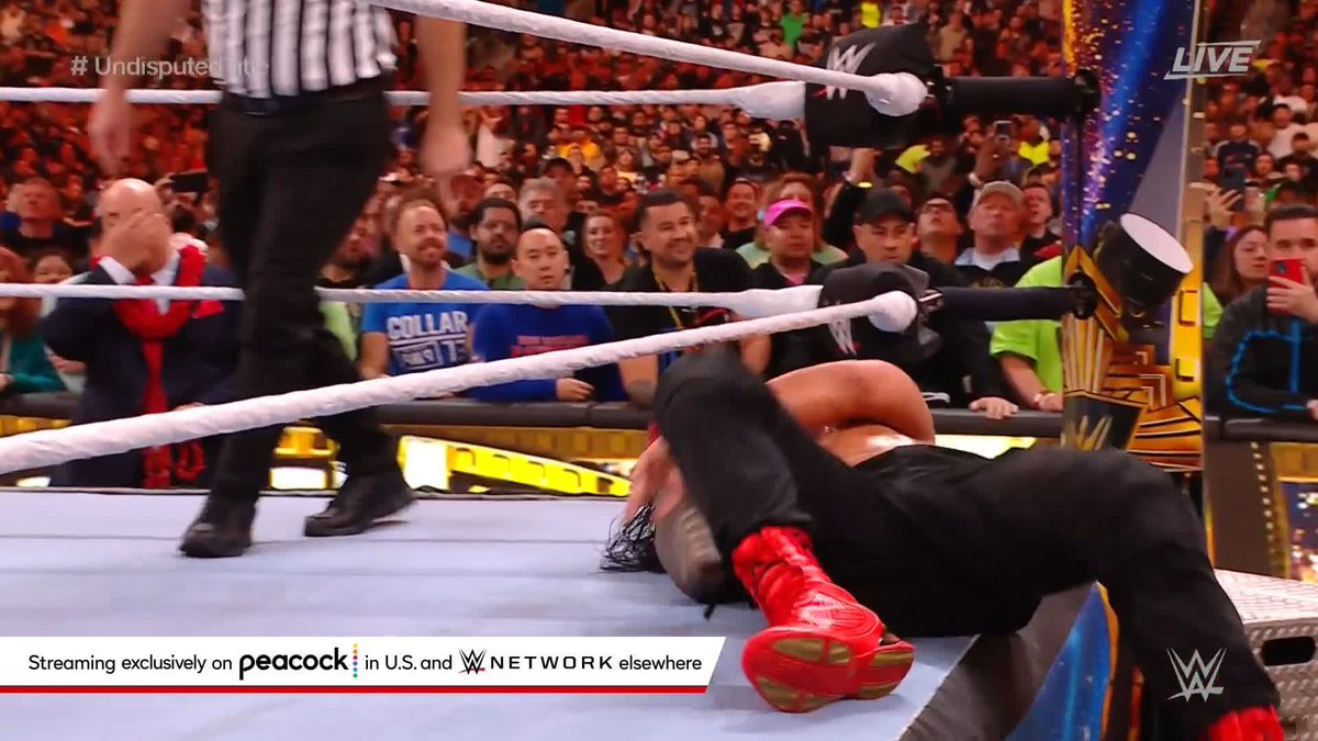 #CodyRhodes sends #RomanReigns through the announce table!!! #WrestleMania