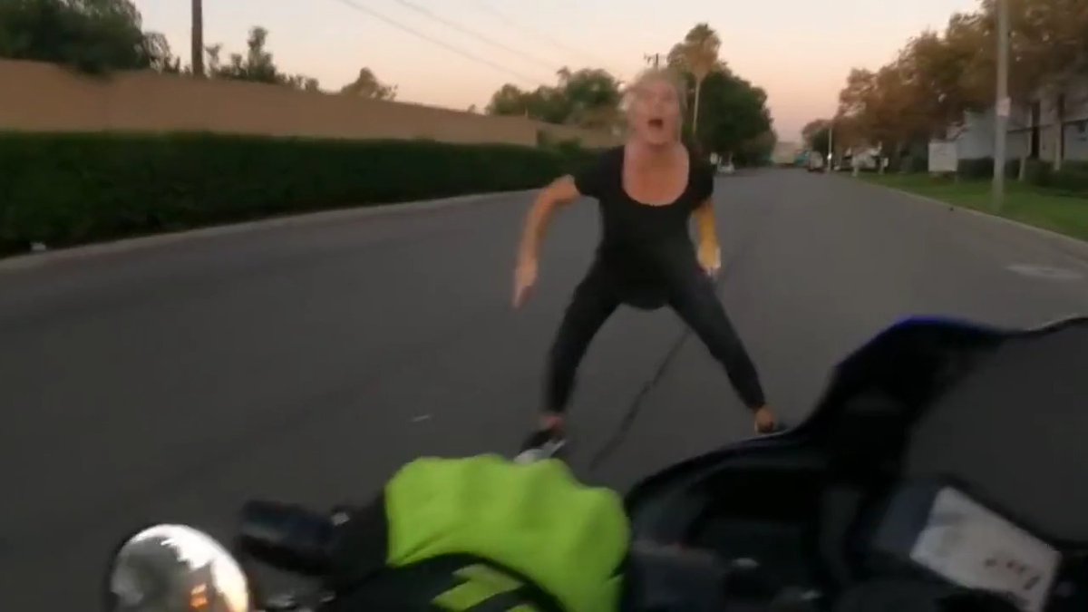 Karen attempts to stop a speeding Motorcycle in the middle of the street only to get all the bones in her Foot Broken...