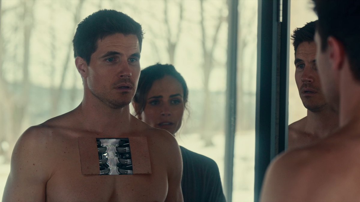 Robbie Amell plays an android out to save his synthetic skin in the new sci-fi action film Simulant. It also stars Jordana Brewster, Simu Liu, and Sam Worthington.
