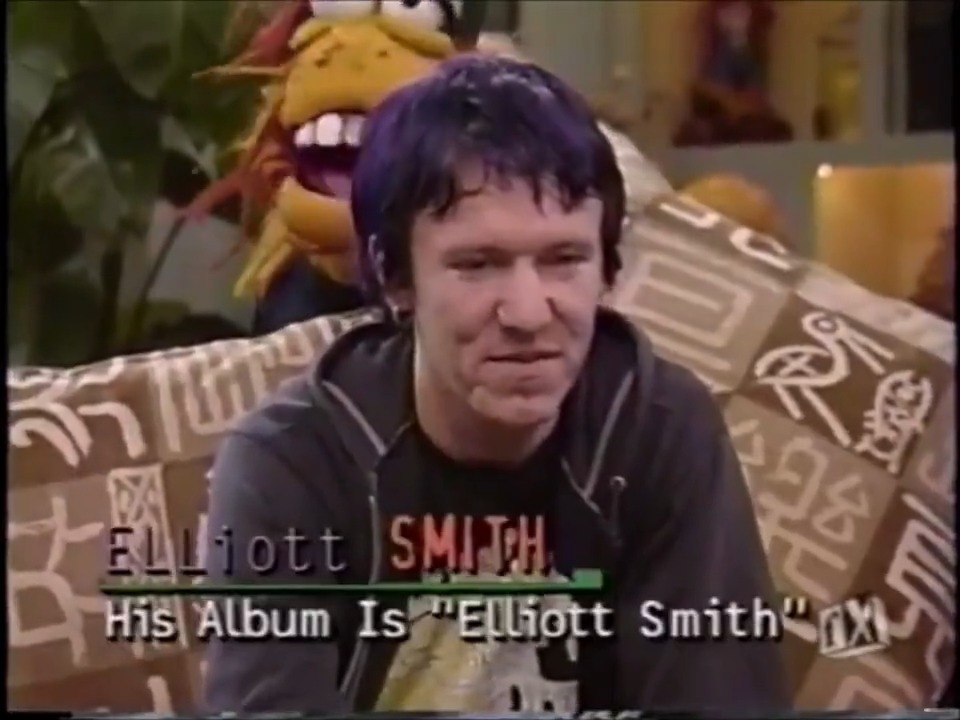 This unearthed Elliott Smith appearance on the 1995 FX morning show 'Breakfast Time' is the most surreal thing you'll see today.