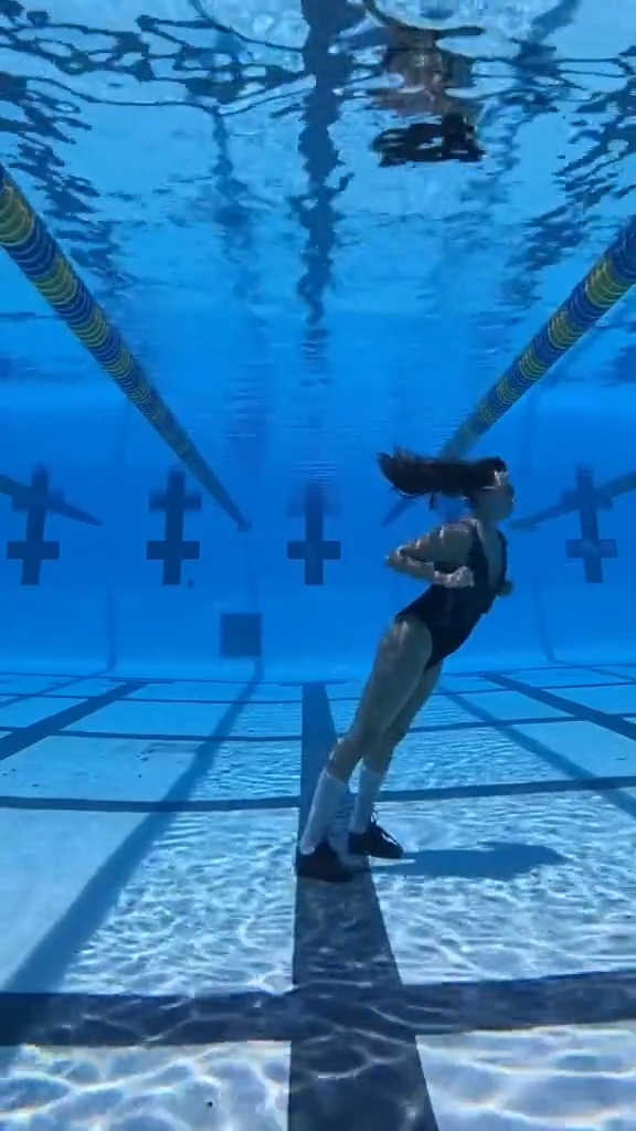 Underwater dancer Kristina Makushenko shows off her upside-down aquatic moonwalk and MJ lean set to Michael’s “Smooth Criminal” on TikTok:
