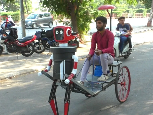 A team of four students from Surat has designed a robot, which can walk like a human being and even pull a rickshaw. (Video credit: PTI)