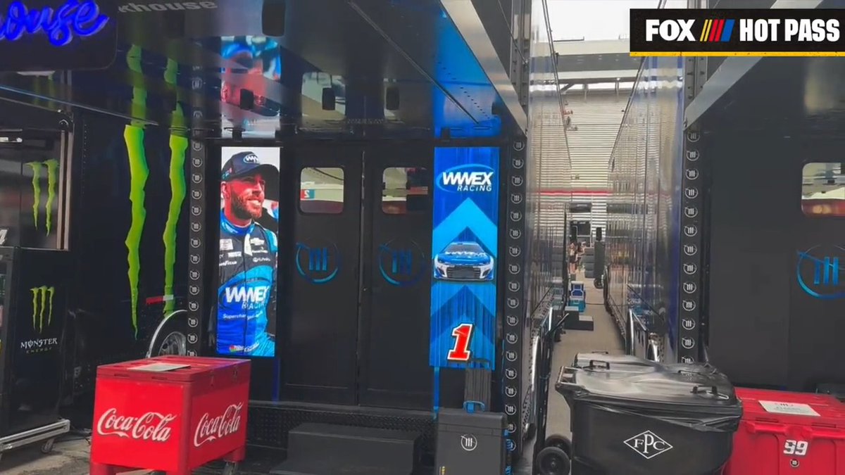 Trackhouse has video boards by the doors of its haulers. #HotPass