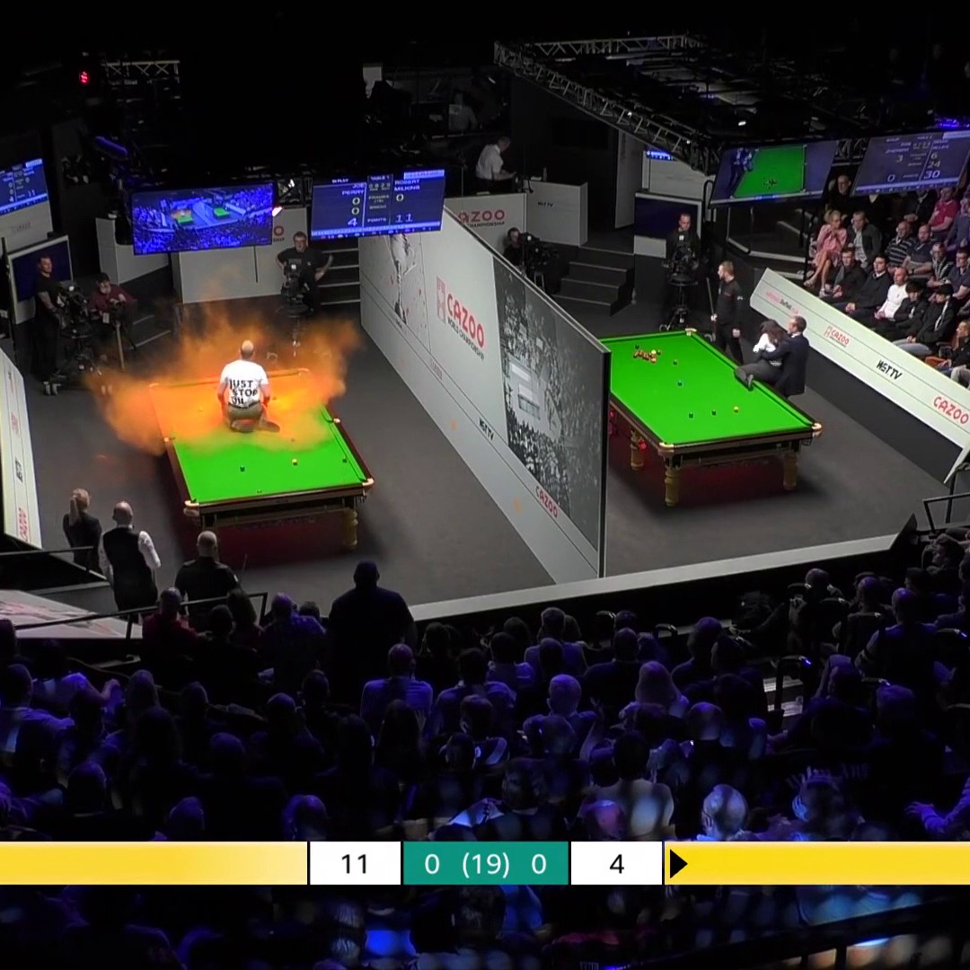 Play has been suspended at the Crucible after a protester jumped on the table and covered it in orange powder. WST | #WorldSnookerChampionship