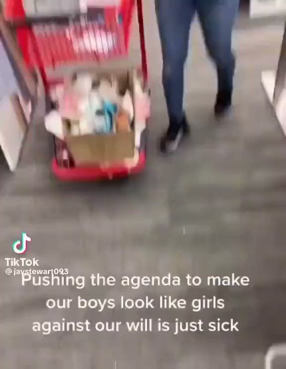 Woman is in shock when she gets to the boys section at Target and see's that all the clothes were in pastel colors with rainbows...