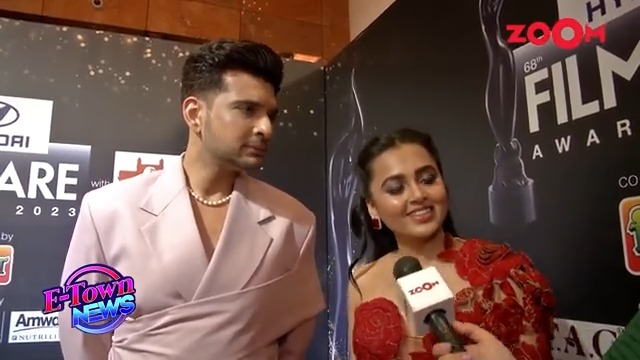 .Karan Kundrra & Tejasswi Prakash got candid with Rudrani Chattoraj on the red carpet of the 68th #HyundaiFilmfareAwards2023 with #MaharashtraTourism about the feeling of attending #Filmfare and getting to see the stars perform on stage. #Tejran #TejasswiPrakash #KaranKundrra #ZoomTV