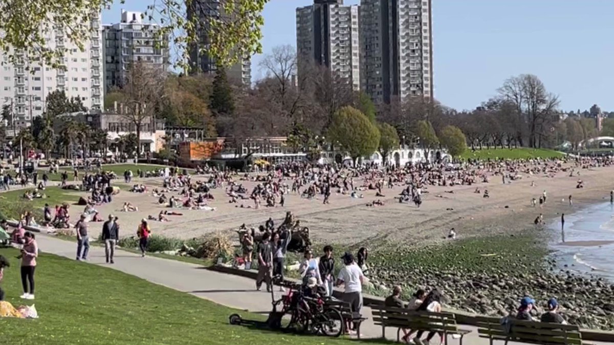 4:40pm English Bay. People have emerged from every corner to enjoy the first summer-like day at English Bay! #Vancouver