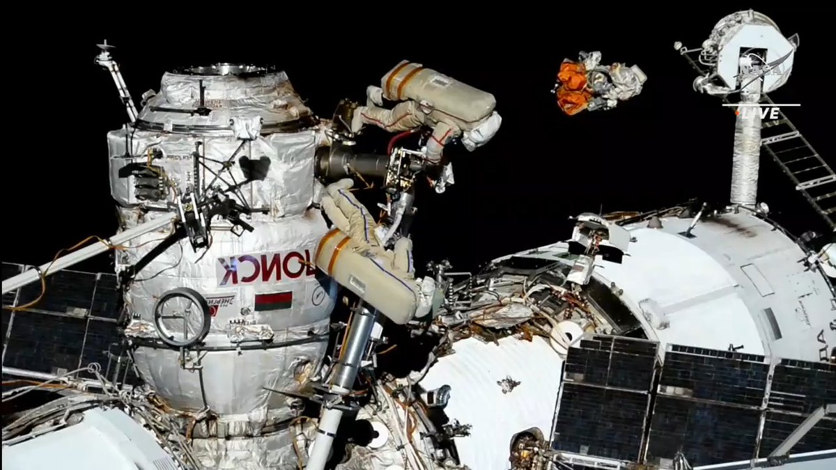 Spacewalker Sergey Prokopyev jettisons a 5-kilogram bundle of obsolete hardware into the vacuum of space to harmlessly burn up in the Earth's atmosphere. Watch now...