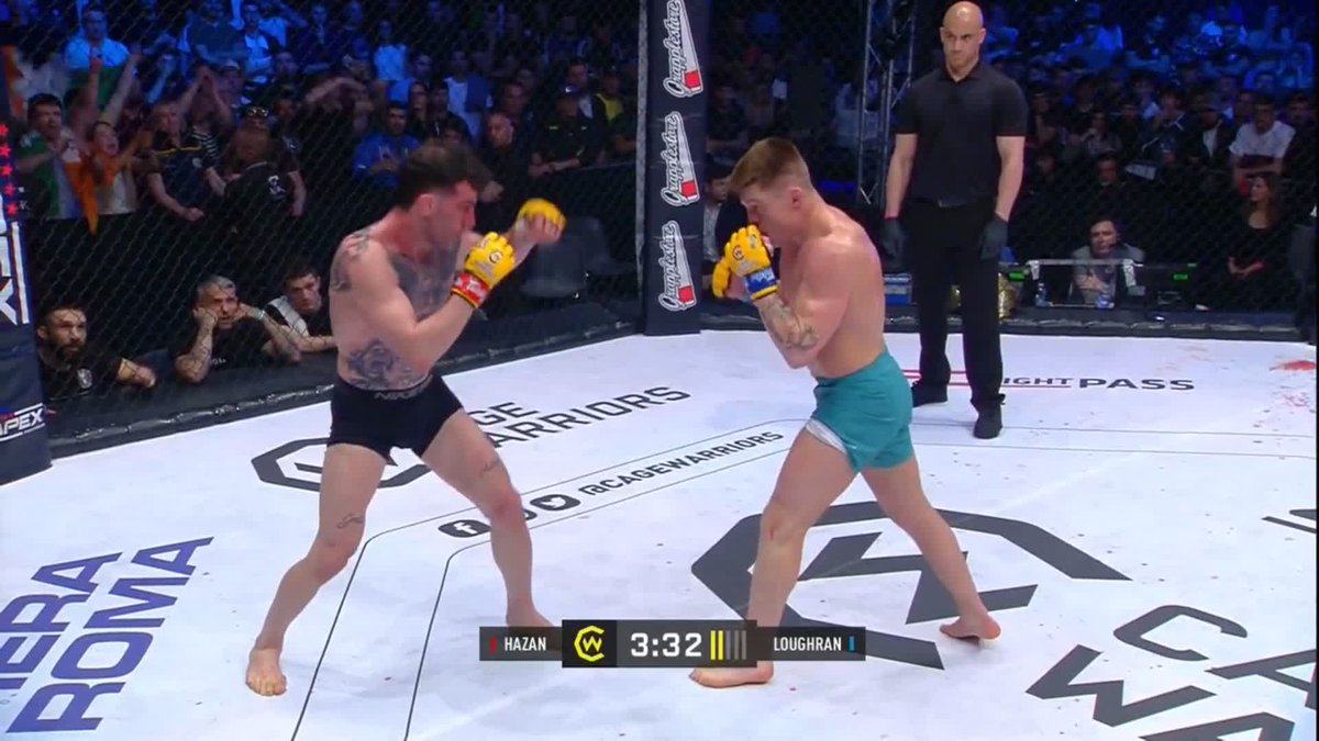 👑 Caolan Loughran gets it DONE! He is the new Cage Warriors Bantamweight champion. Finishing his opponent in an early fight of the year candidate! #CW154