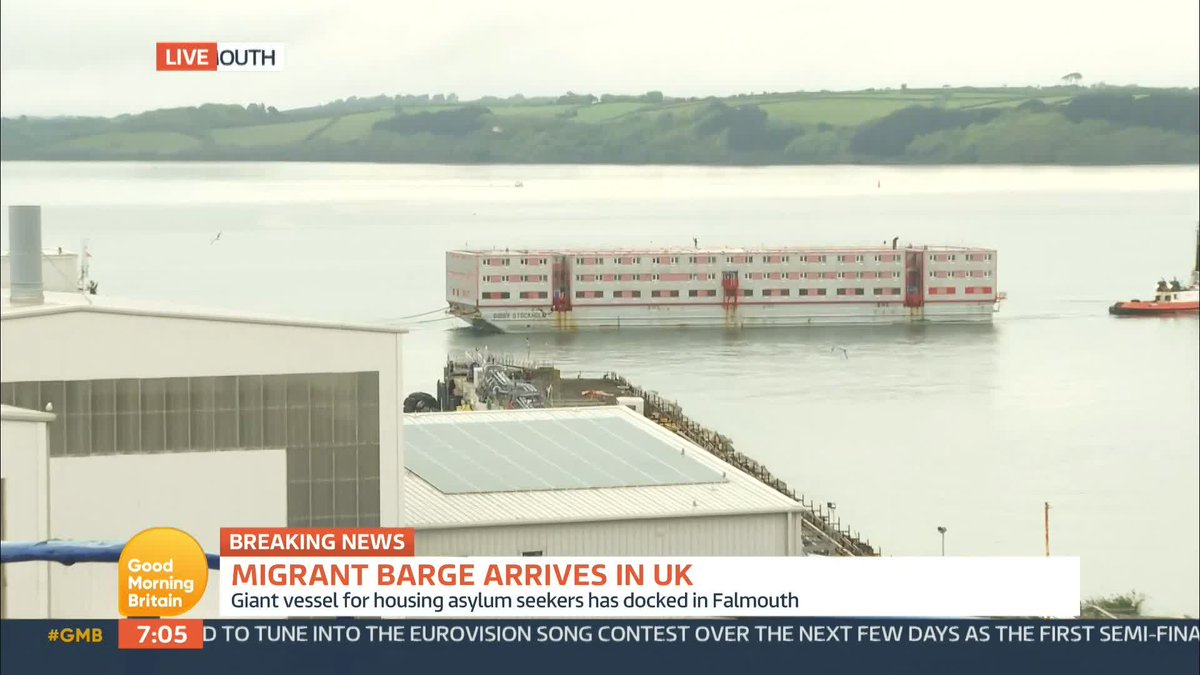 Breaking: A three-storey barge, which will be used to house migrants has arrived in Falmouth for repairs and renovations. It is expected to be ready to house 500 people by mid-June.