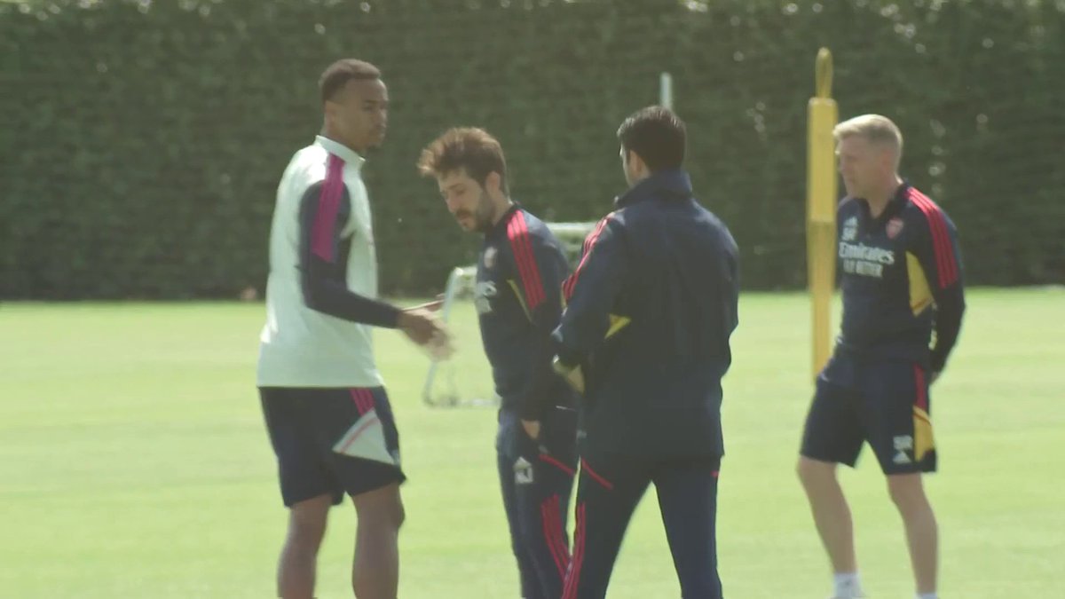 Mikel Arteta greeting his Arsenal players in training at London Colney this morning. 👋