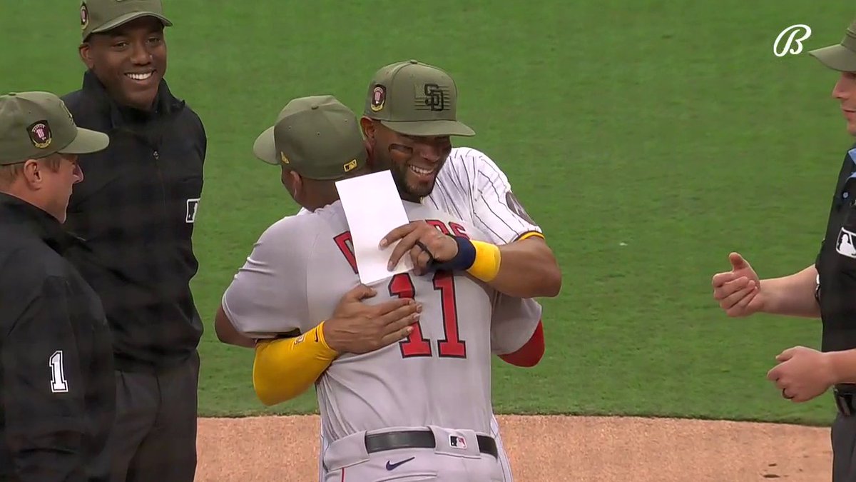 Rafael Devers and Xander Bogaerts exchanging lineup cards 😭