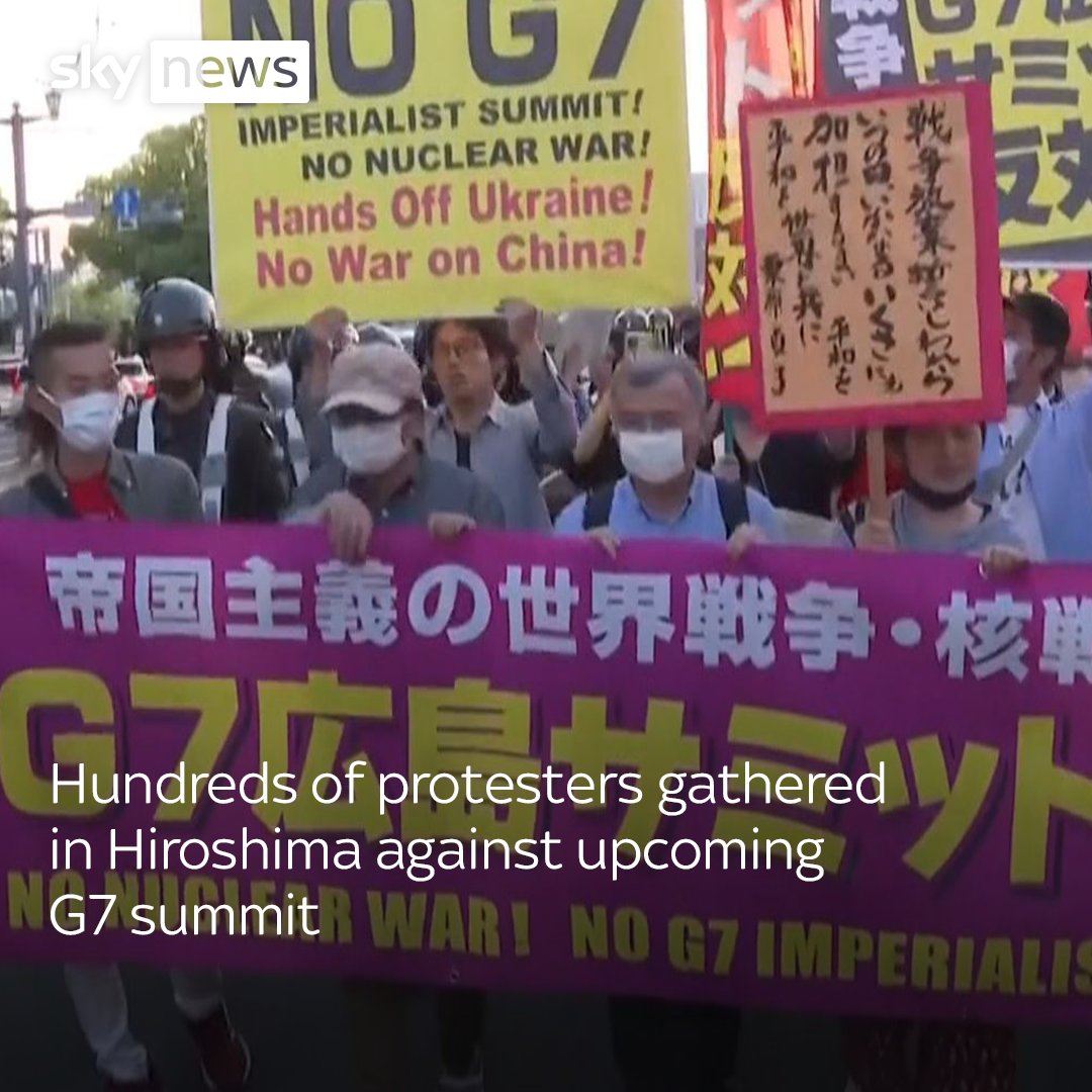 Residents in Hiroshima, Japan protest against the G7 Summit. They carry banners read “No G7.”