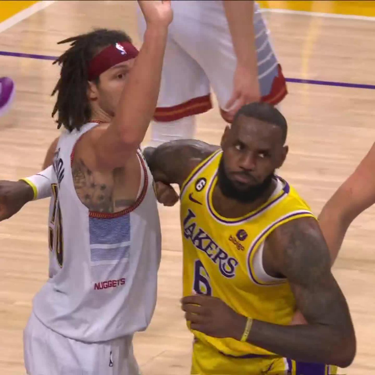 LeBron and Aaron Gordon got into it on this possession 😳
