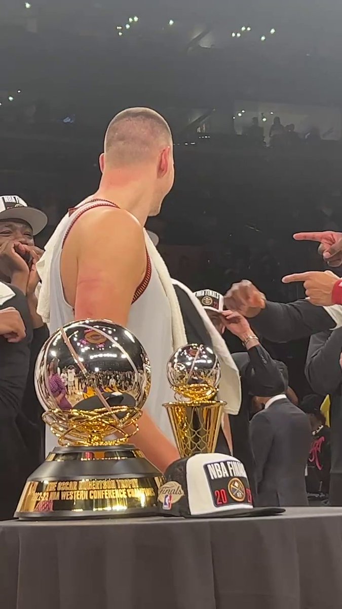Jokic really wanted to know who smacked him while he got his MVP trophy 😂🏆
